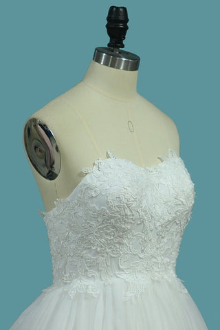 2024 una línea de vestidos de novia de tul con apliques barrido / cepillo de tren