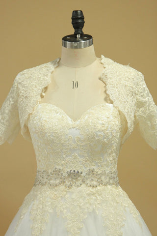 2024 espalda abierta una línea vestidos de novia de tul con aplicaciones de tejido y los granos de la capilla de tren
