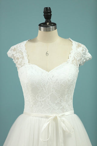 2024 Una línea de vestidos de novia del hombro Tulle con apliques y marco
